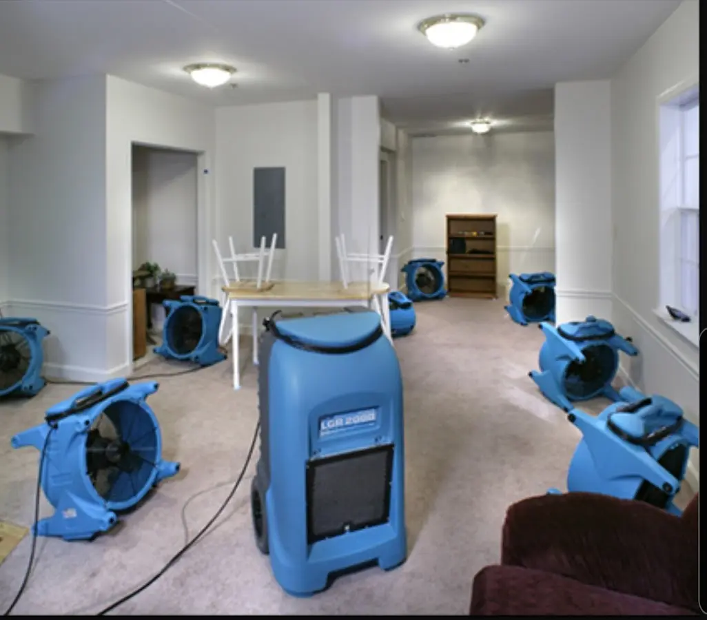 Air movers and dehumidifier setup for Water Damage Restoration in Oakfield